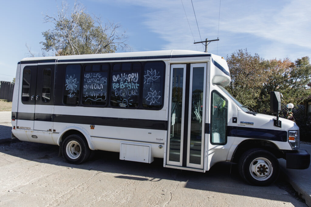 A bus used to transport disabled adults is decorated with uplifting sayings and bright colors. TVDSI offers transportation services to adults who have intellectual and developmental disabilities – taking them to doctors appointments, to and from TVDSI Day Centers, social outings, and more.